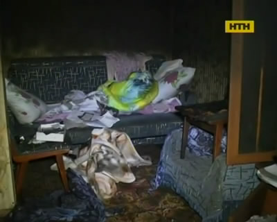 В Днепропетровске парень жестоко убил соседку и поджег ее квартиру